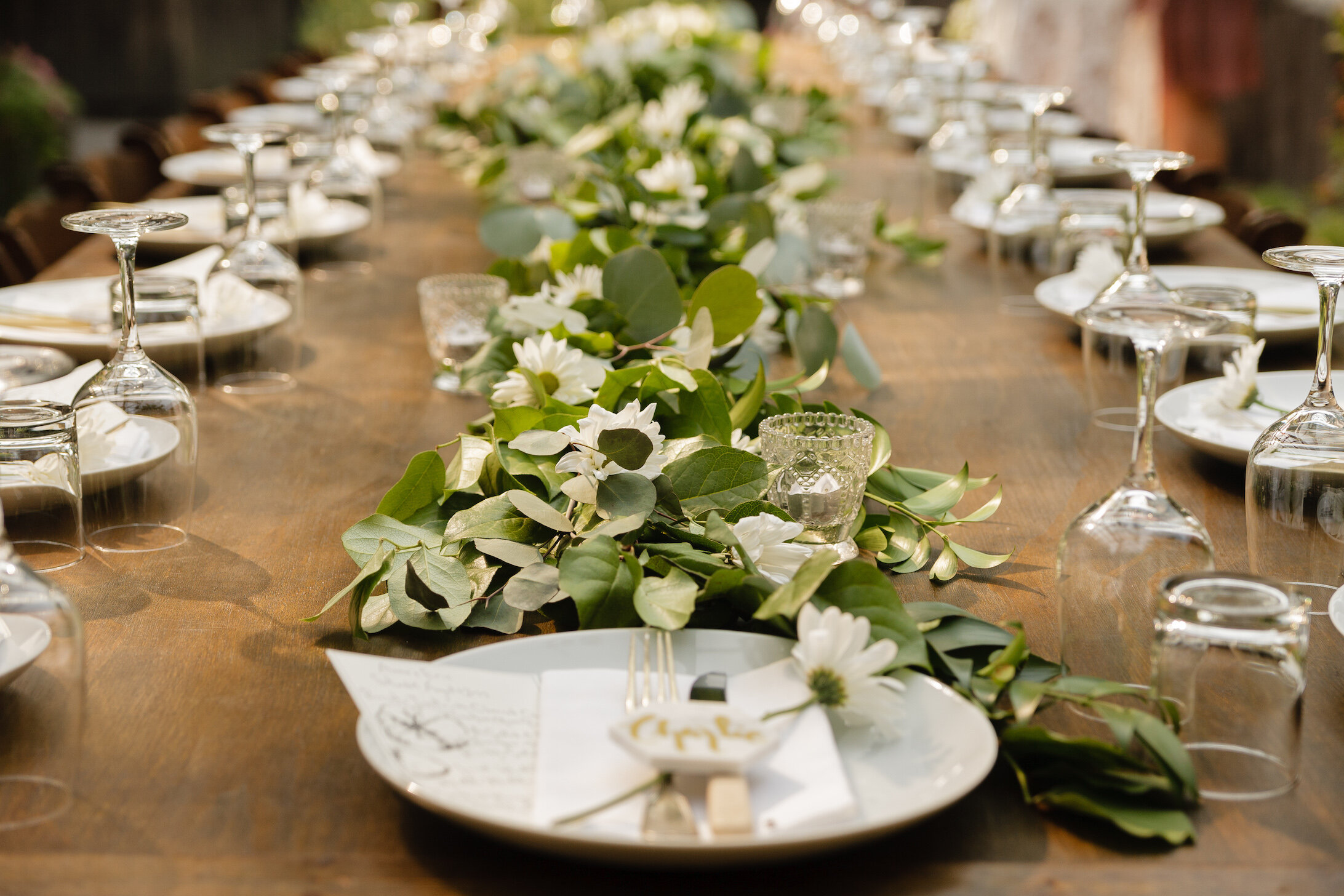 plates and flowers on wedding table.jpg