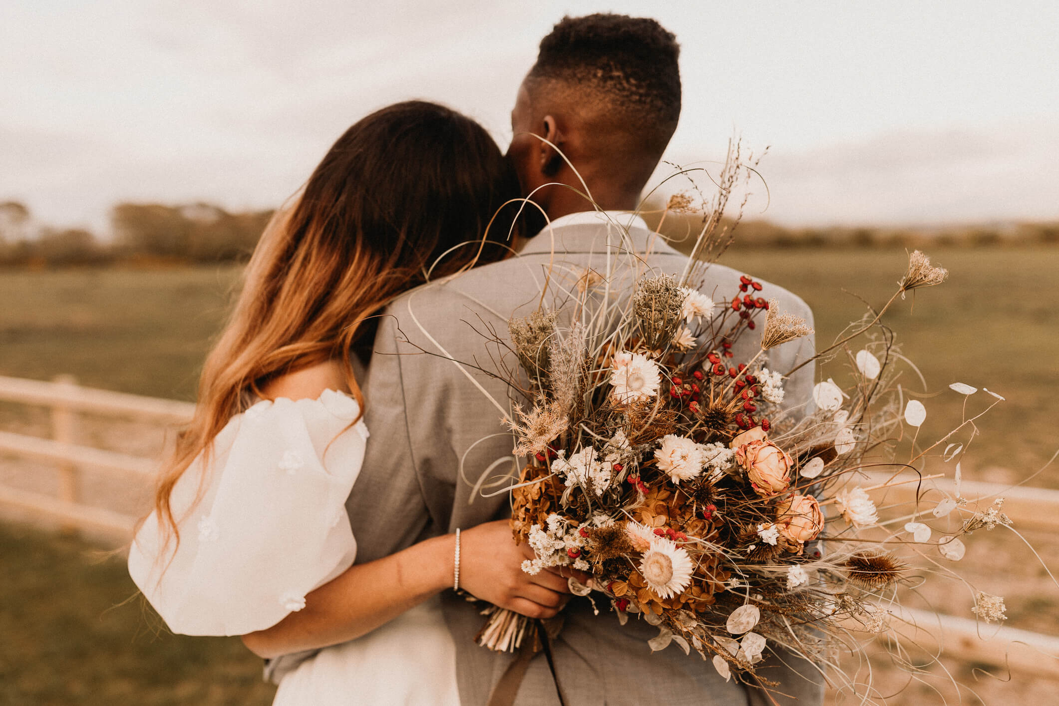 A Wedding Ceremony Trend We're Loving: Grounded Floral Arches