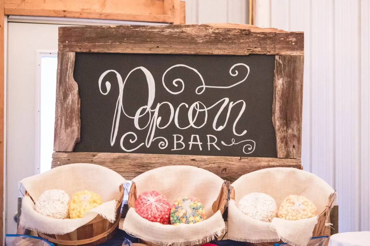 Wedding popcorn bar sign and packaged popcorn