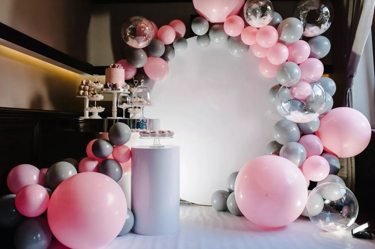 beautiful wedding balloon arch with pink and gray balloons