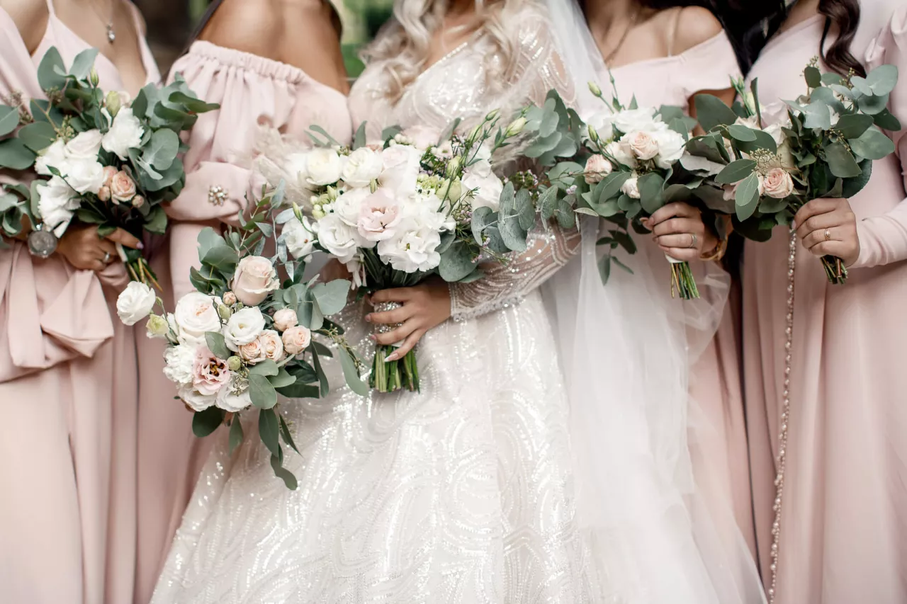 bride and bridesmaids with their bouquets