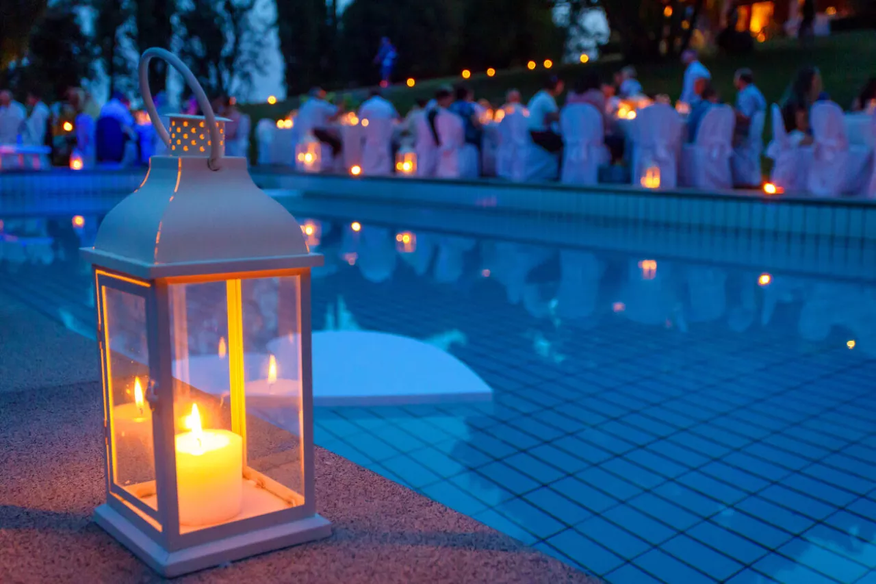 lantern placed by poolside for wedding