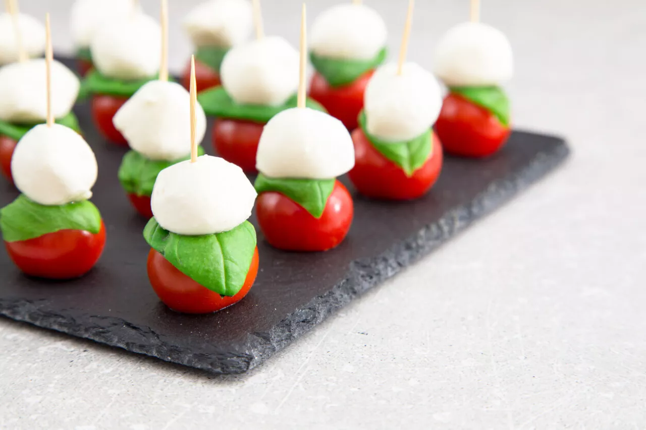 caprese skewers on serving tray for summer wedding