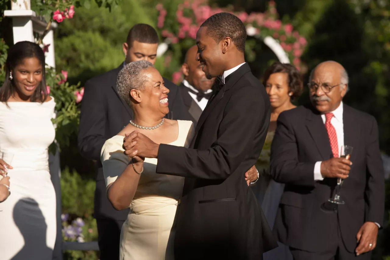 groom and his mother dance at his wedding