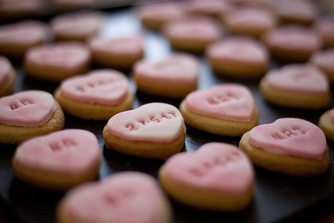 personalized cookies on display table for wedding