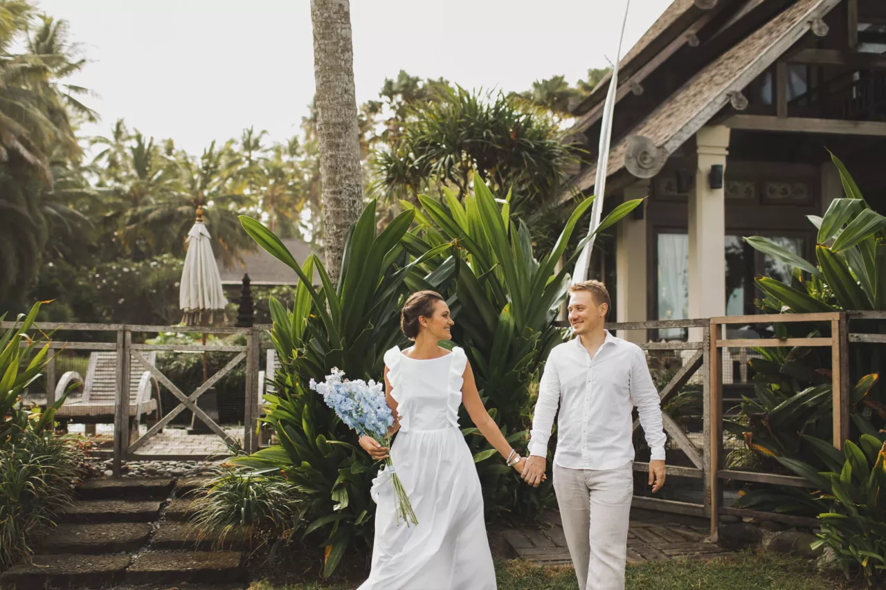 bride and groom laugh after tropical elopement
