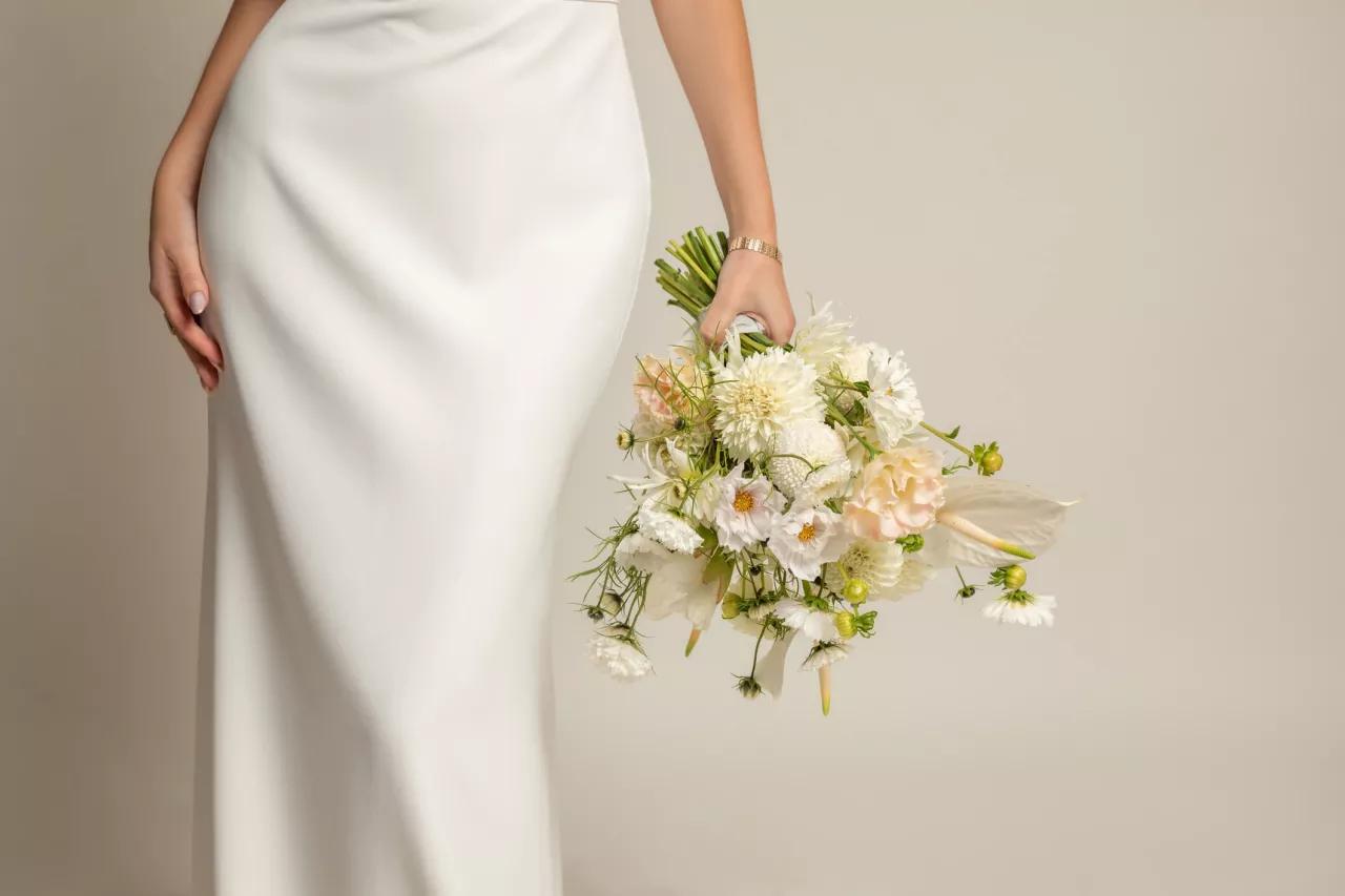 wedding gown with bridal bouquet